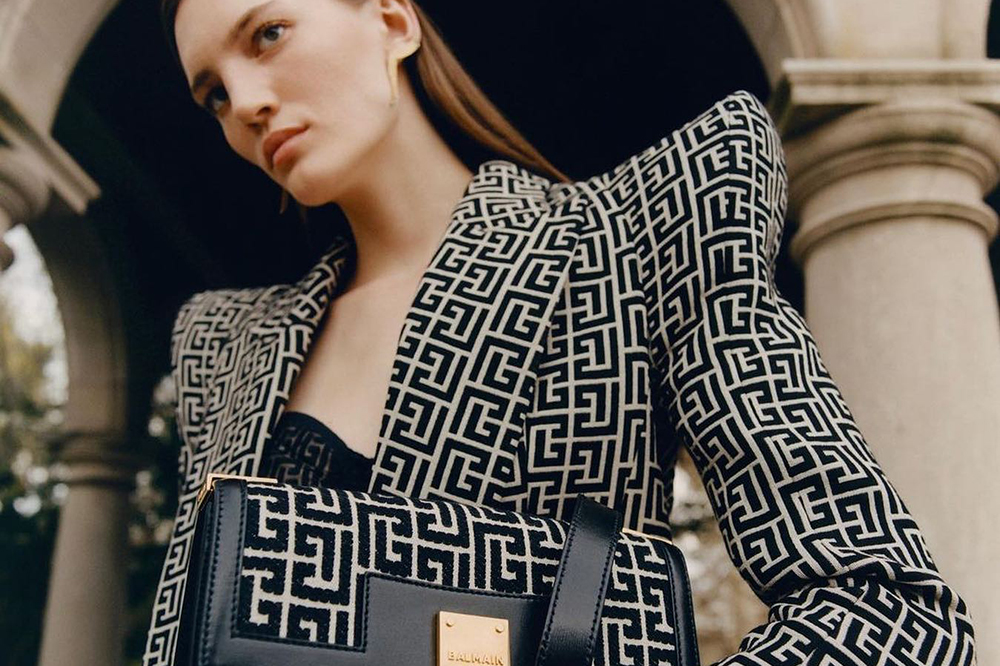 Balmain clothing and bag advertsing