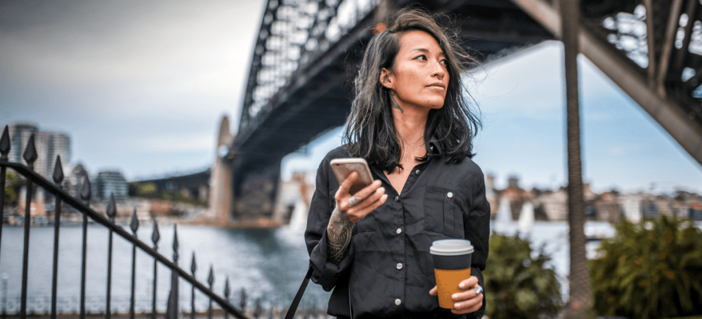 Woman using phone in Sydney